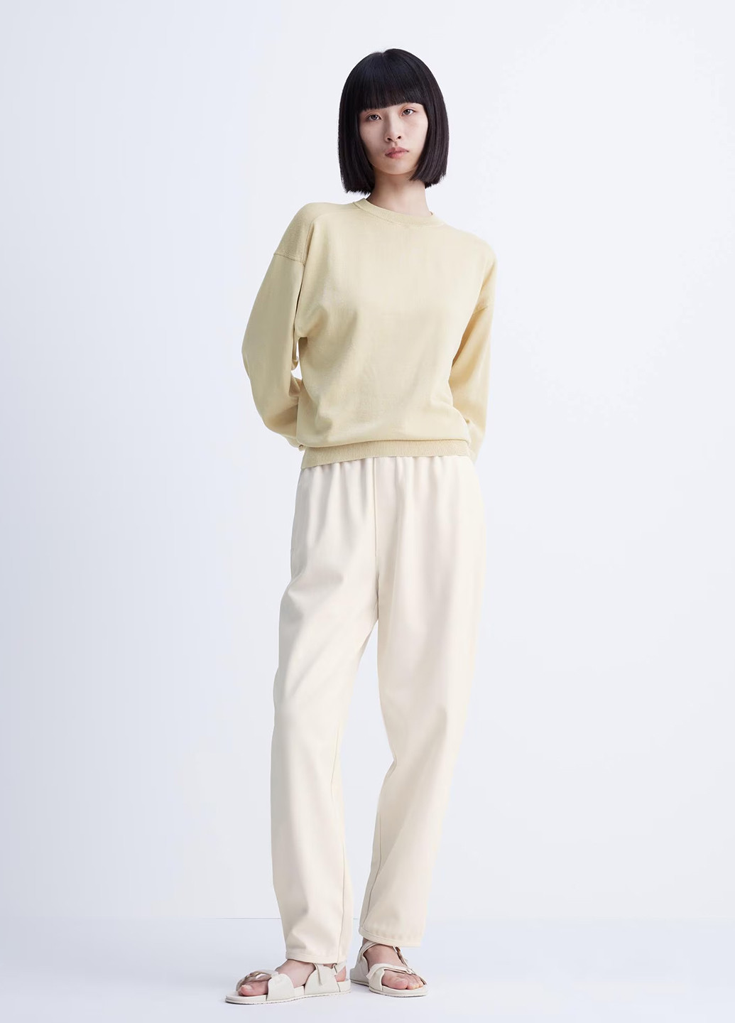 Бежевый свитшот Uniqlo однотонный без декора (296802939)