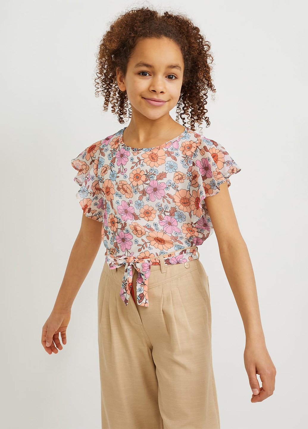Молочная цветочной расцветки блузка C&A летняя