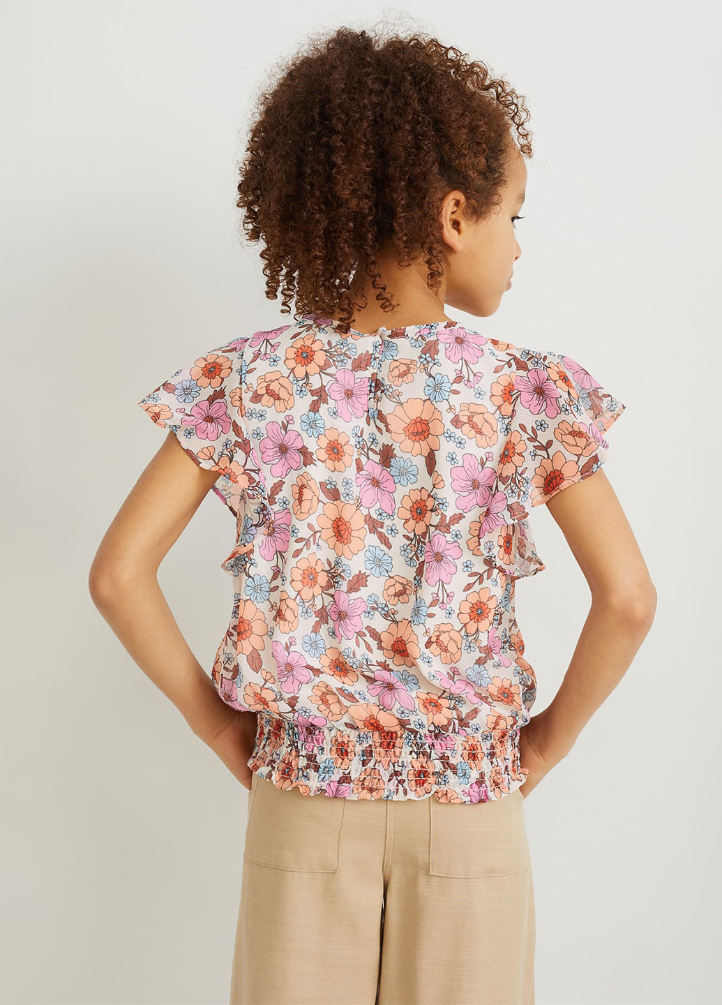 Молочная цветочной расцветки блузка C&A летняя
