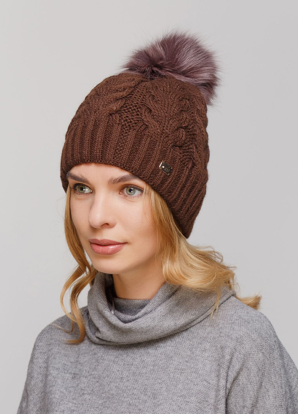 Зимняя теплая женская шапка на флисовой подкладке 550588 Merlini (249643239)