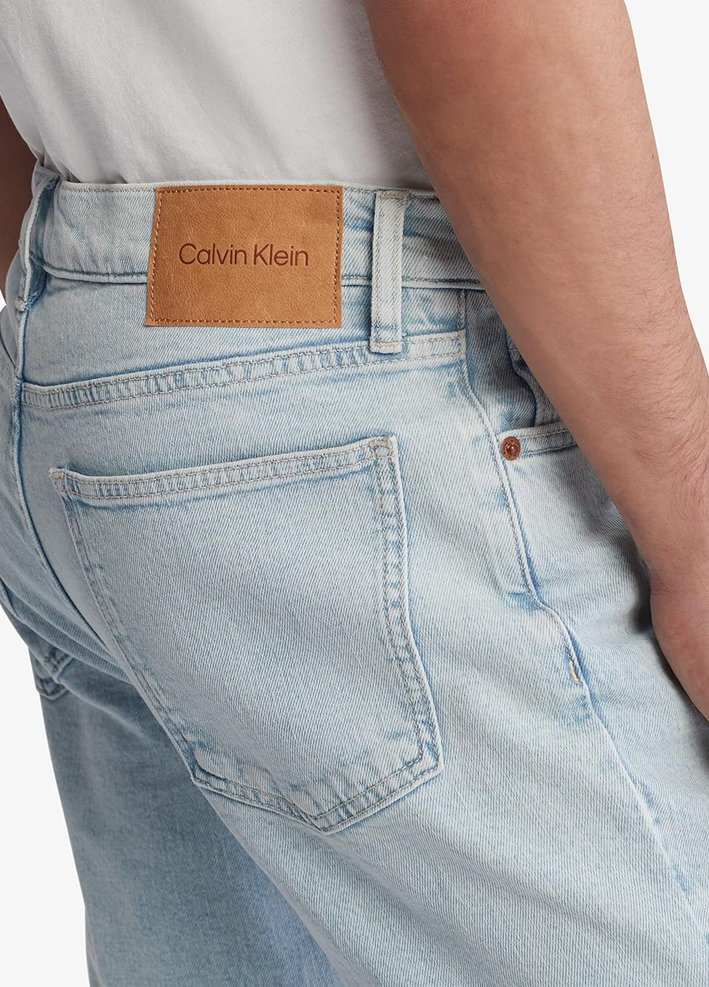 Голубые демисезонные зауженные джинсы Calvin Klein