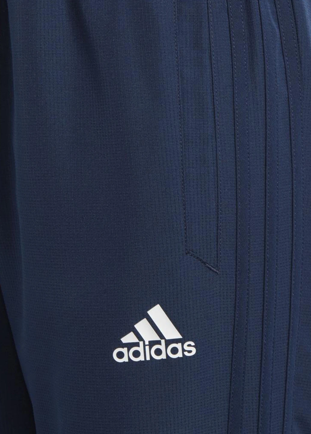 Синие спортивные демисезонные зауженные брюки adidas