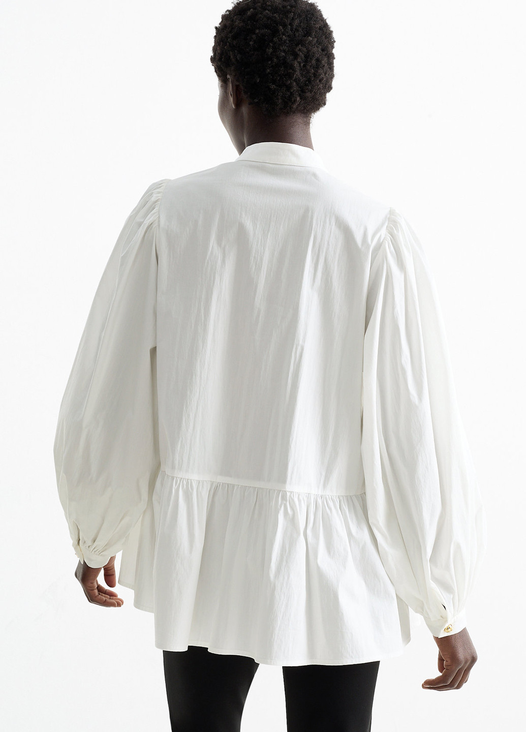 Біла блуза з баскою C&A