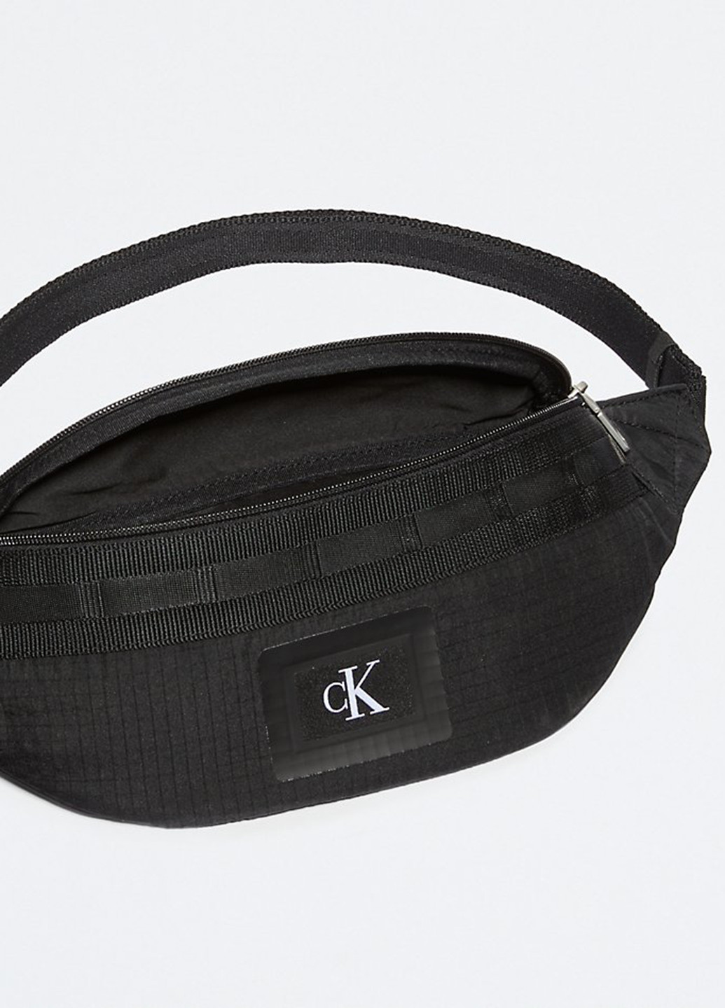Сумка Calvin Klein поясная сумка однотонная чёрная кэжуал