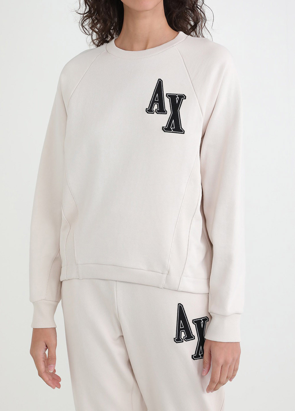 Светло-бежевый свитшот Armani Exchange однотонный аппликация (305838973)