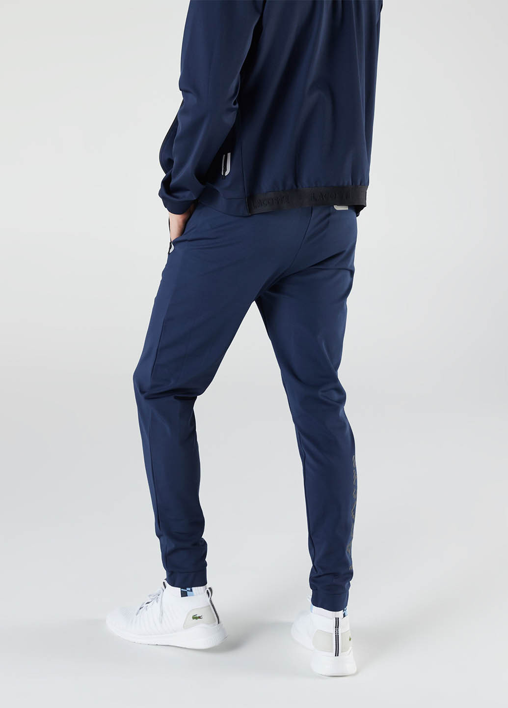 Темно-синие спортивные демисезонные джоггеры брюки Lacoste