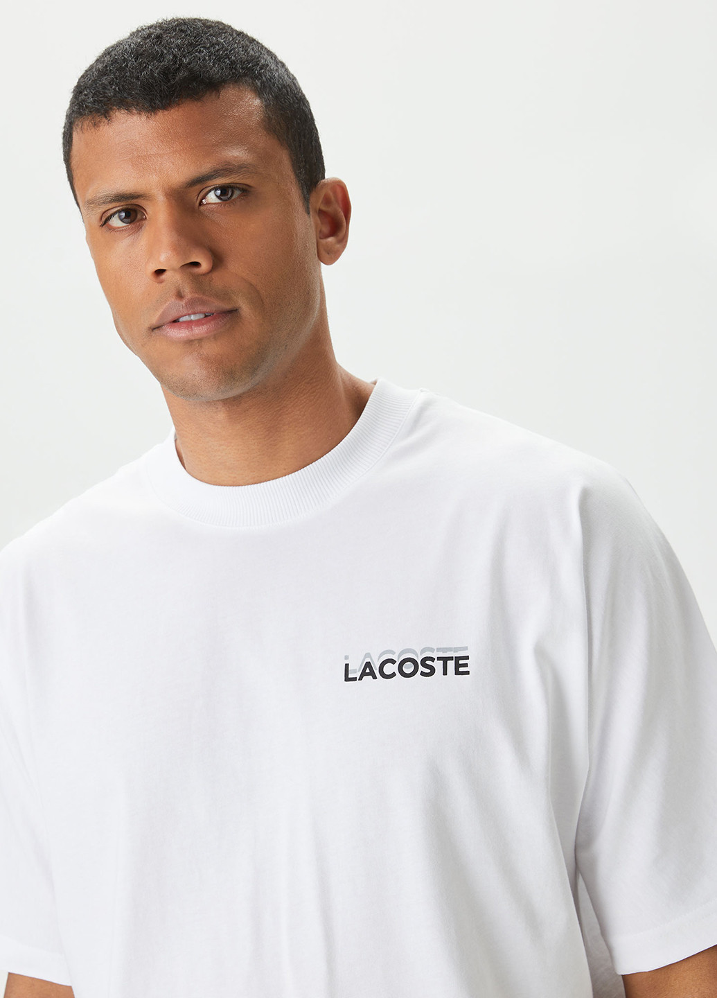 Белая футболка Lacoste