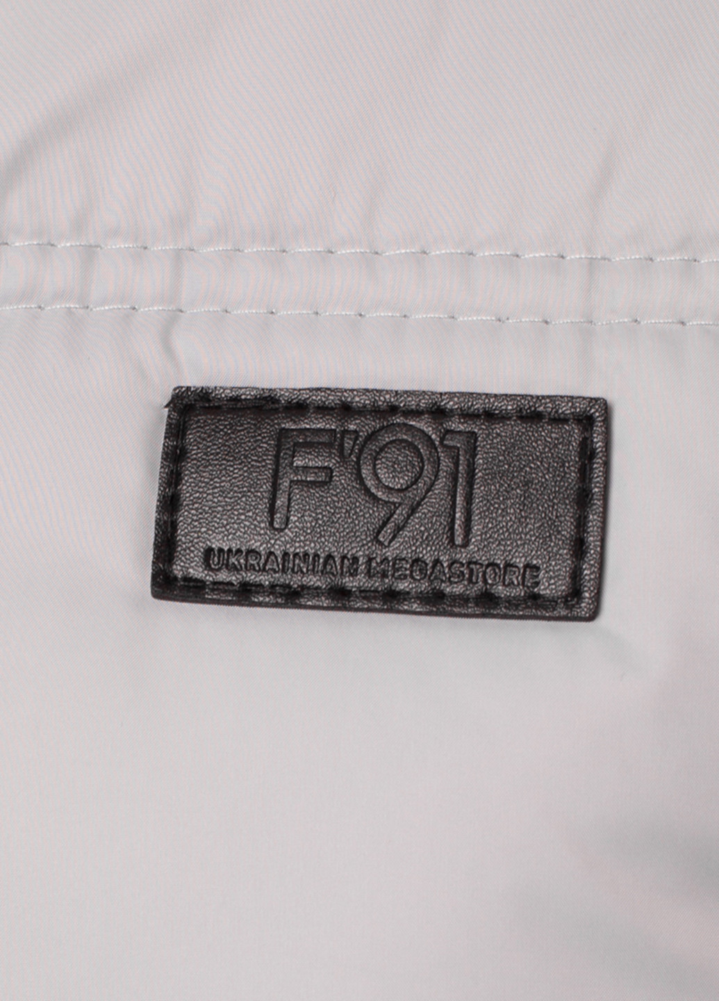 Світло-сіра зимня куртка F'91