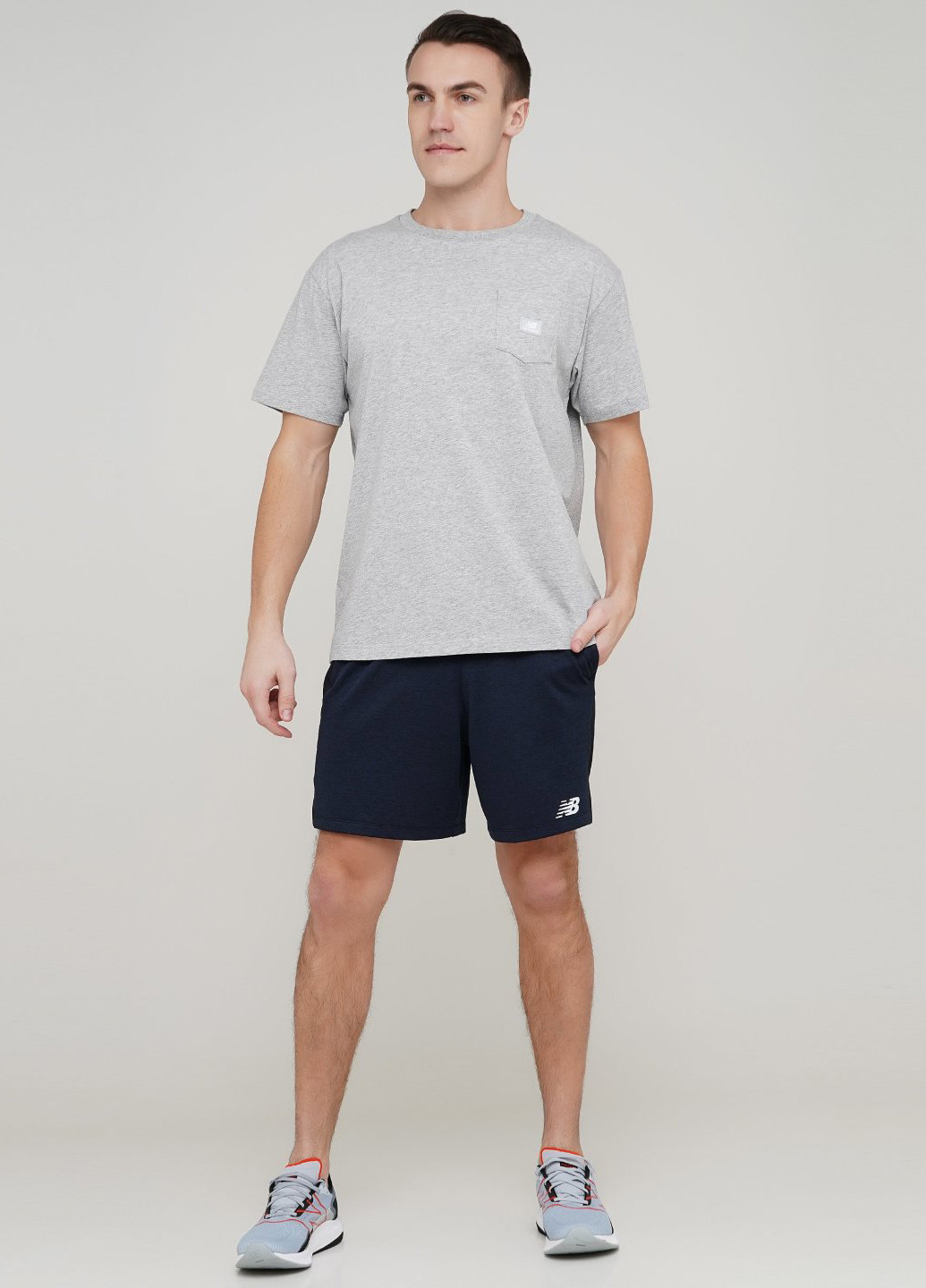 Світло-сіра футболка New Balance Nb Athletics Pocket