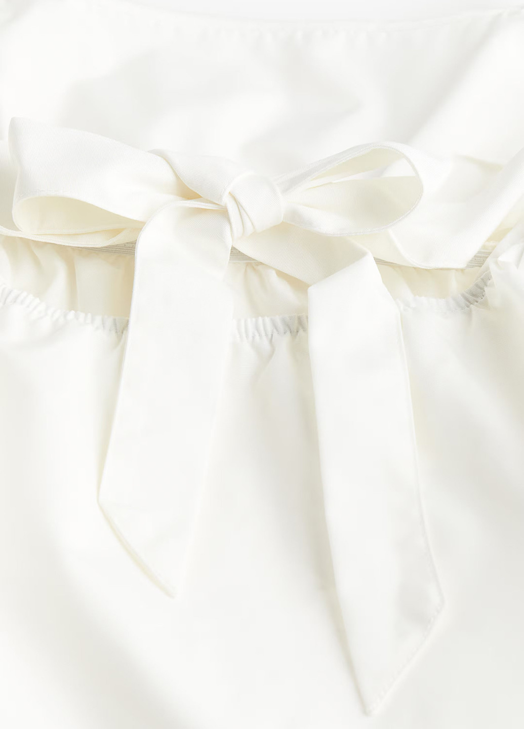 Біла блуза з баскою H&M