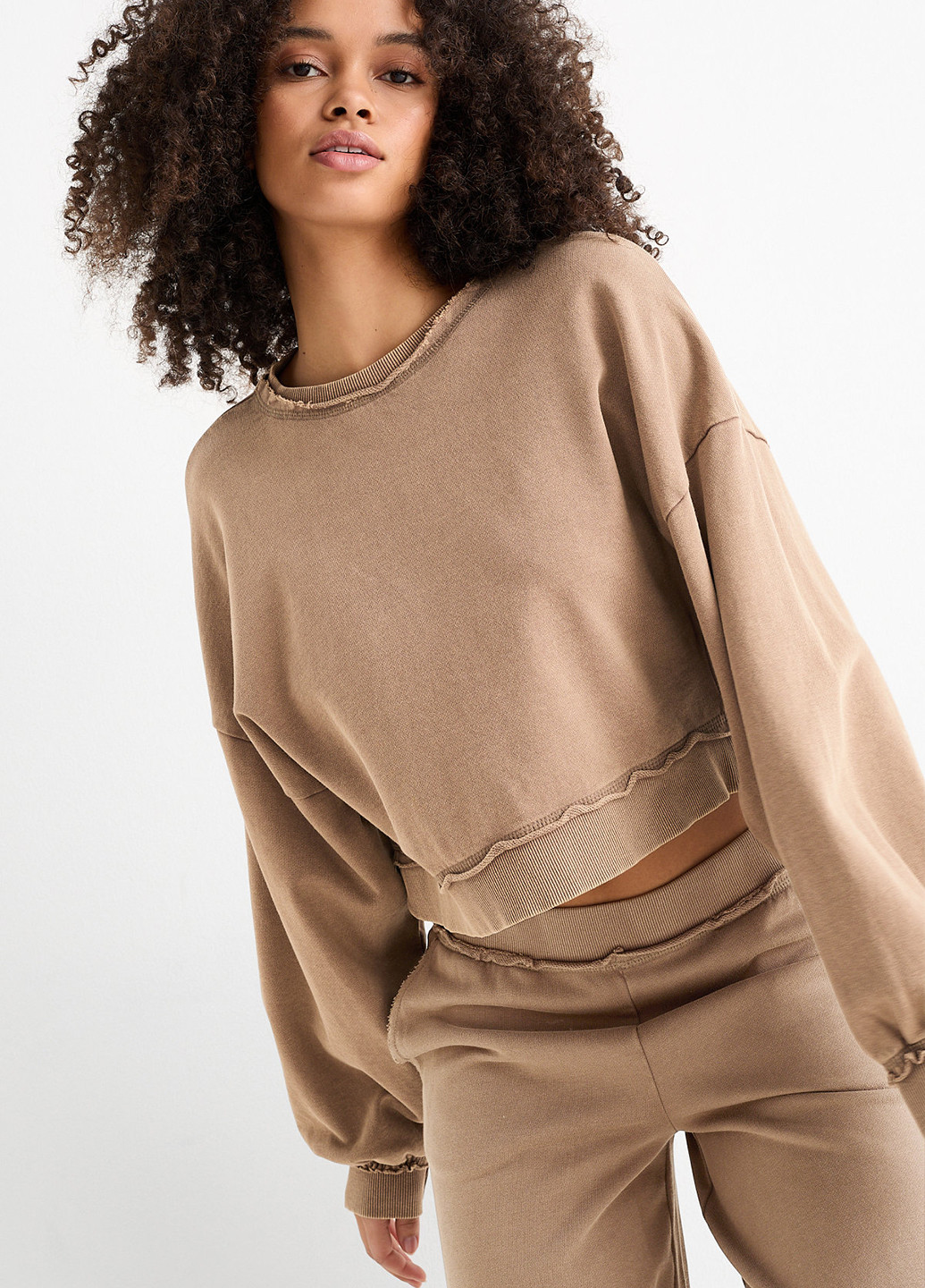 Темно-бежевий світшот C&A однотонний без декору (362157903)