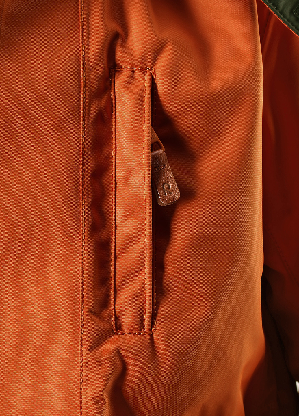 Оранжевая зимняя куртка Reima