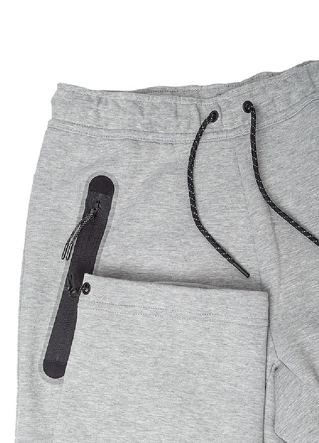Светло-серые спортивные демисезонные зауженные брюки Nike