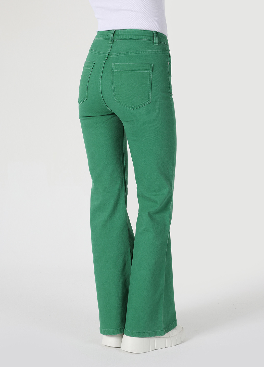 Зеленые джинсовые демисезонные клеш брюки Colin's