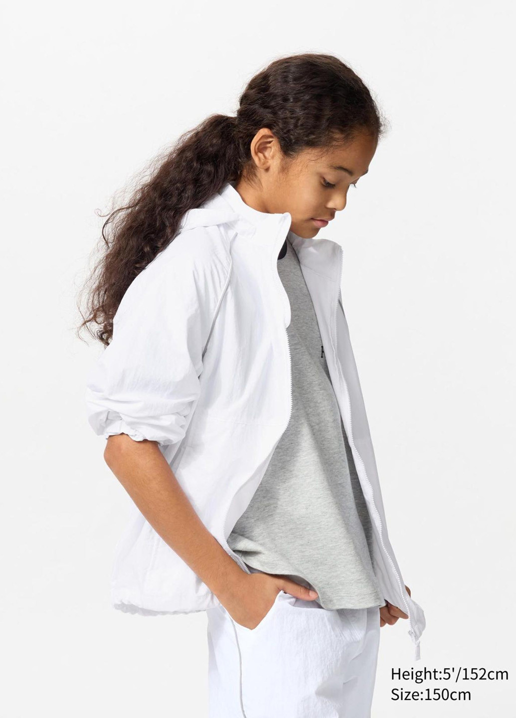 Біла демісезонна вітровка Uniqlo