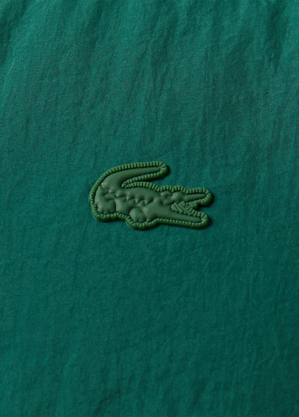 Темно-зелена демісезонна куртка Lacoste