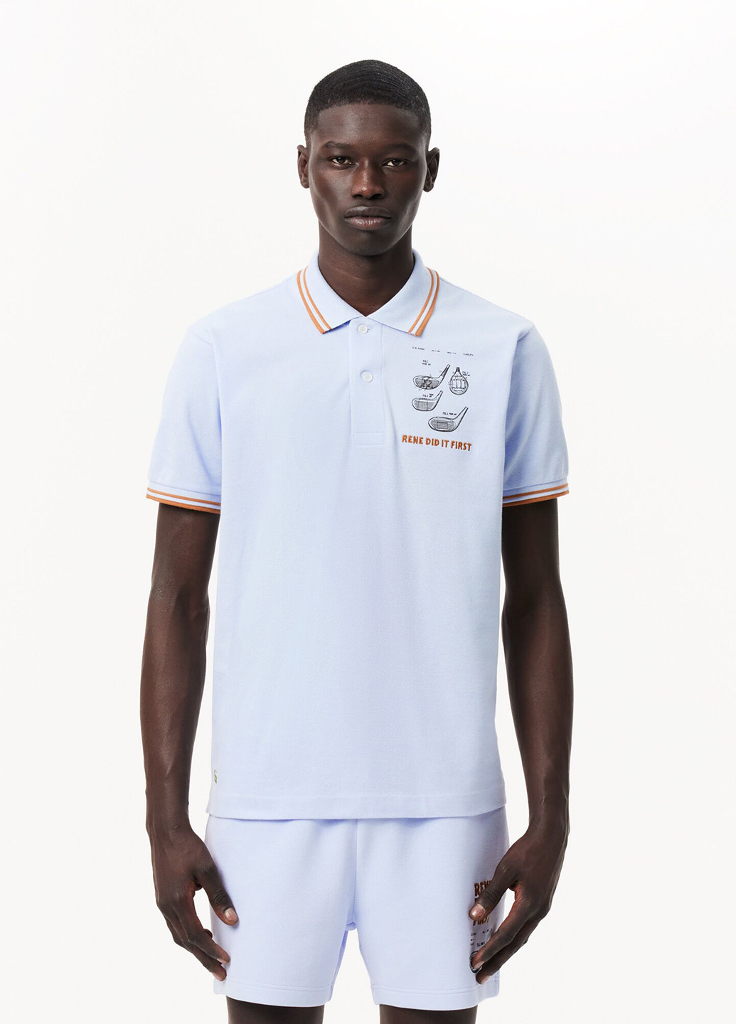 Светло-голубой футболка-поло для мужчин Lacoste с рисунком