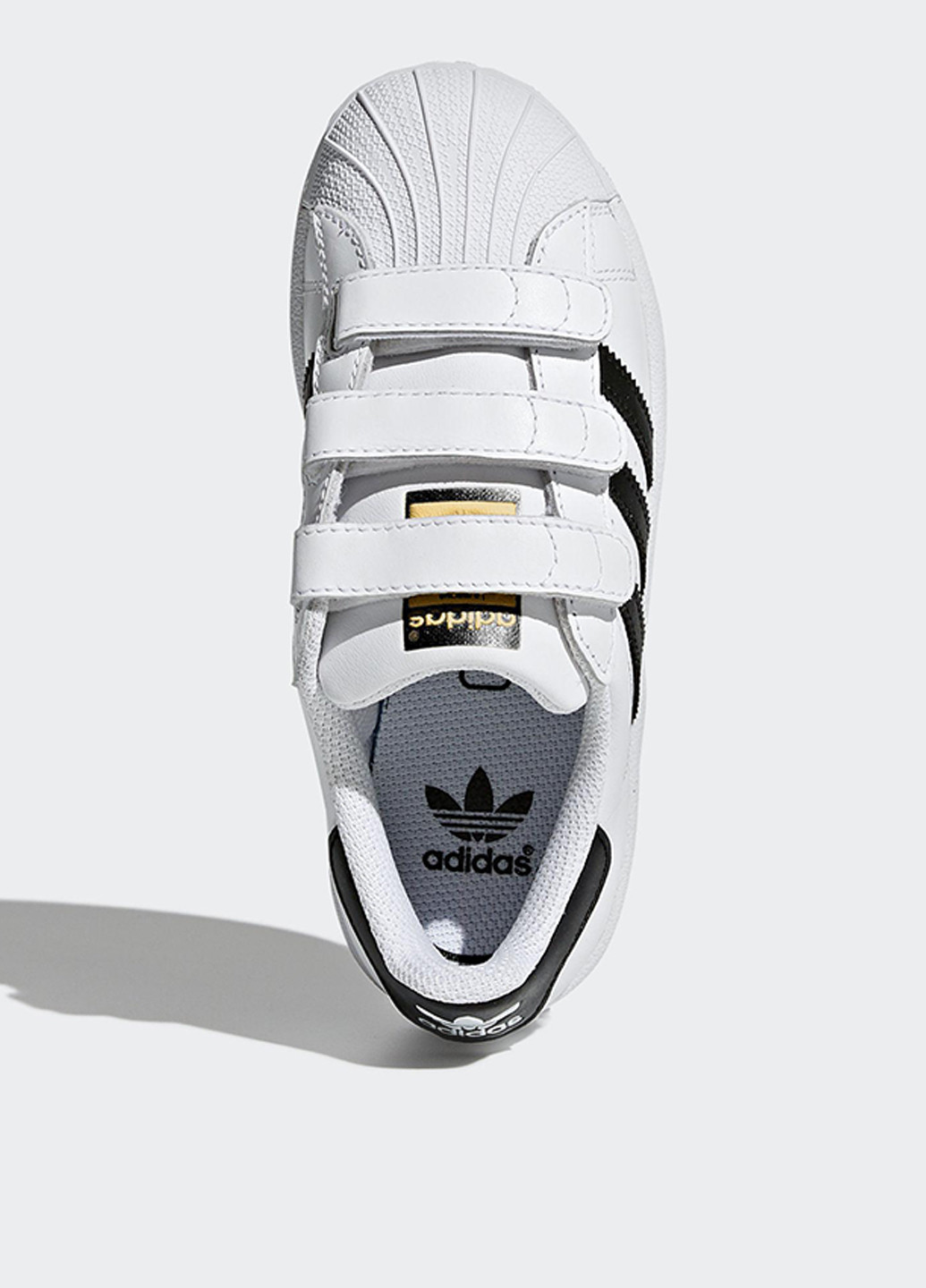Білі всесезонні кросівки adidas