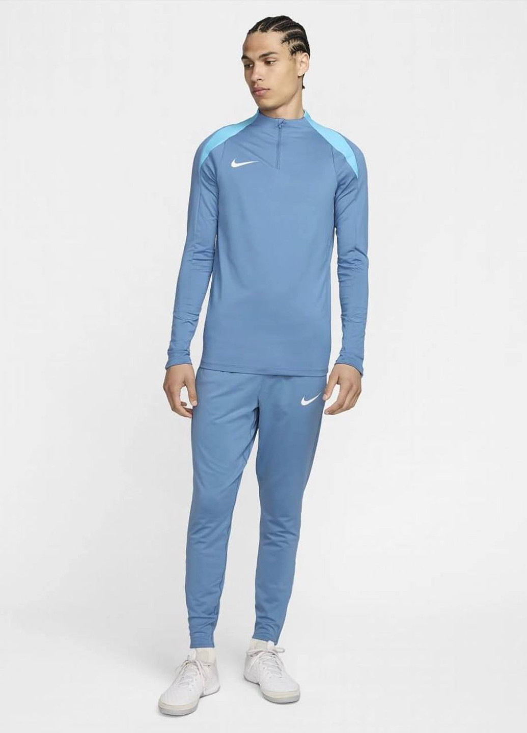 Светло-синие спортивные демисезонные зауженные брюки Nike