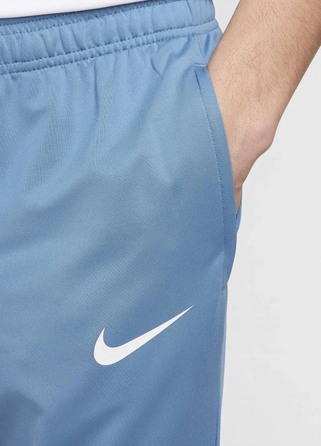 Светло-синие спортивные демисезонные зауженные брюки Nike