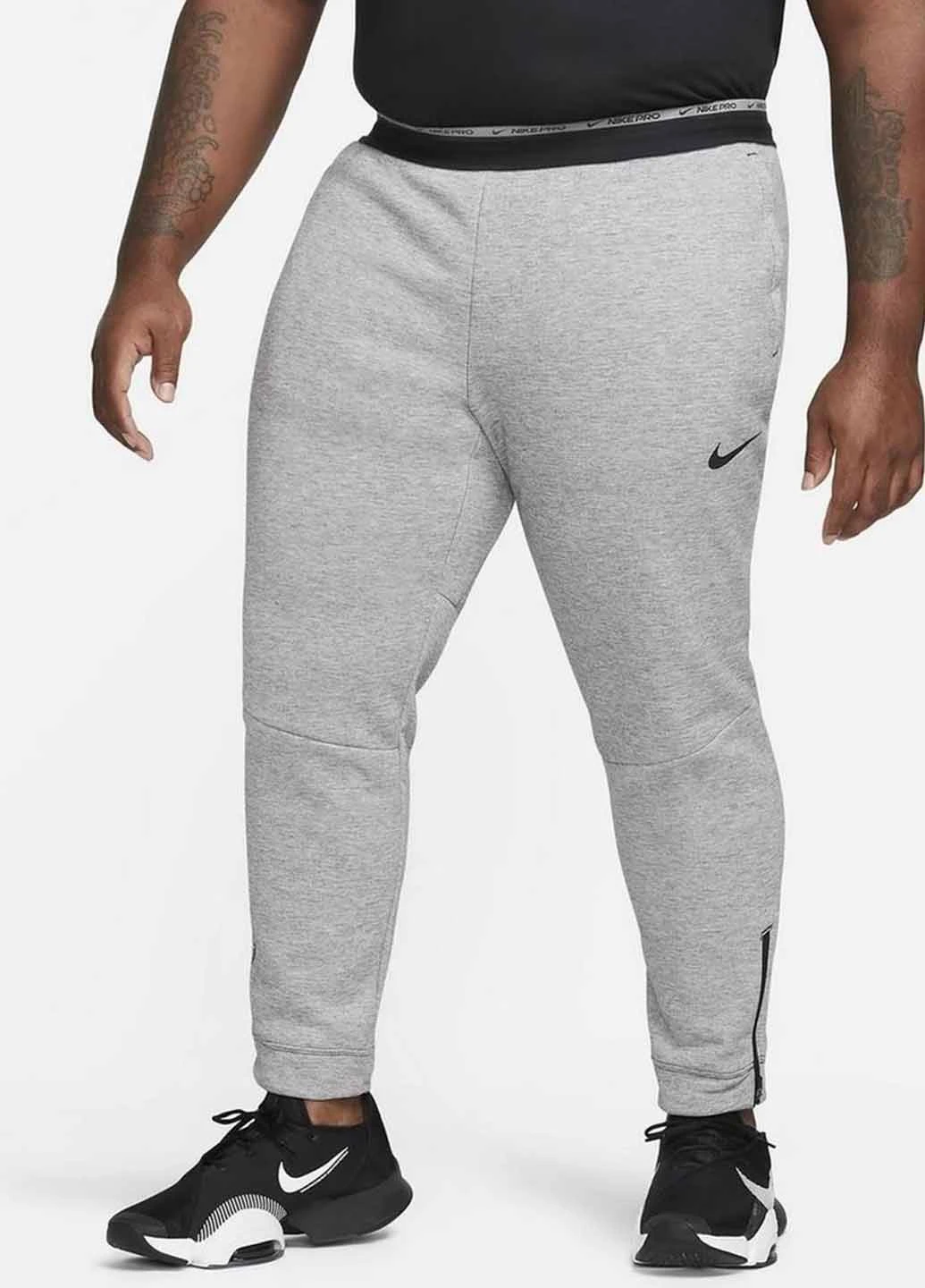 Серые спортивные демисезонные джоггеры брюки Nike