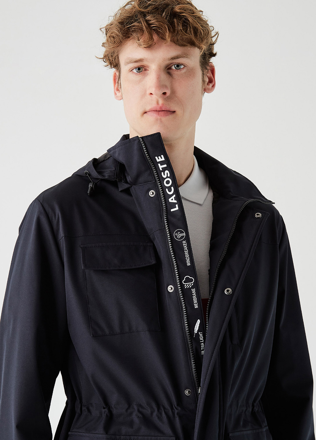 Темно-синяя демисезонная куртка Lacoste