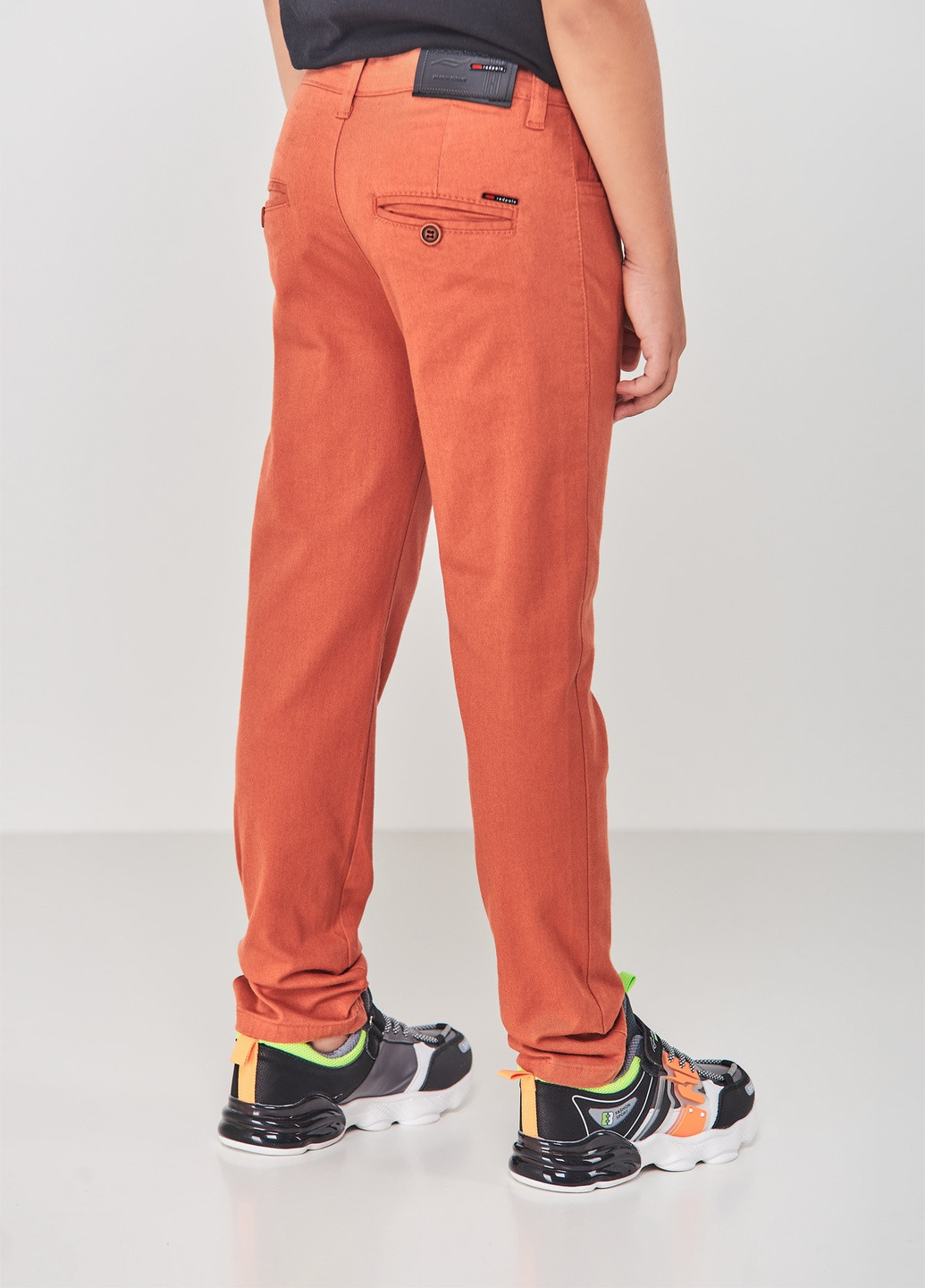 Оранжевые кэжуал демисезонные брюки Redpolo