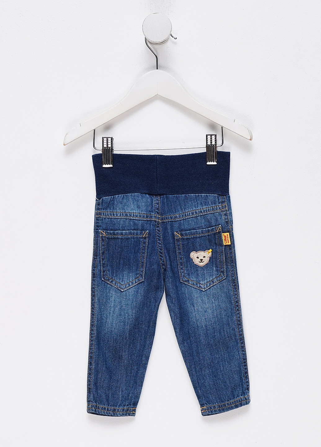 Синие демисезонные зауженные джинсы Steiff