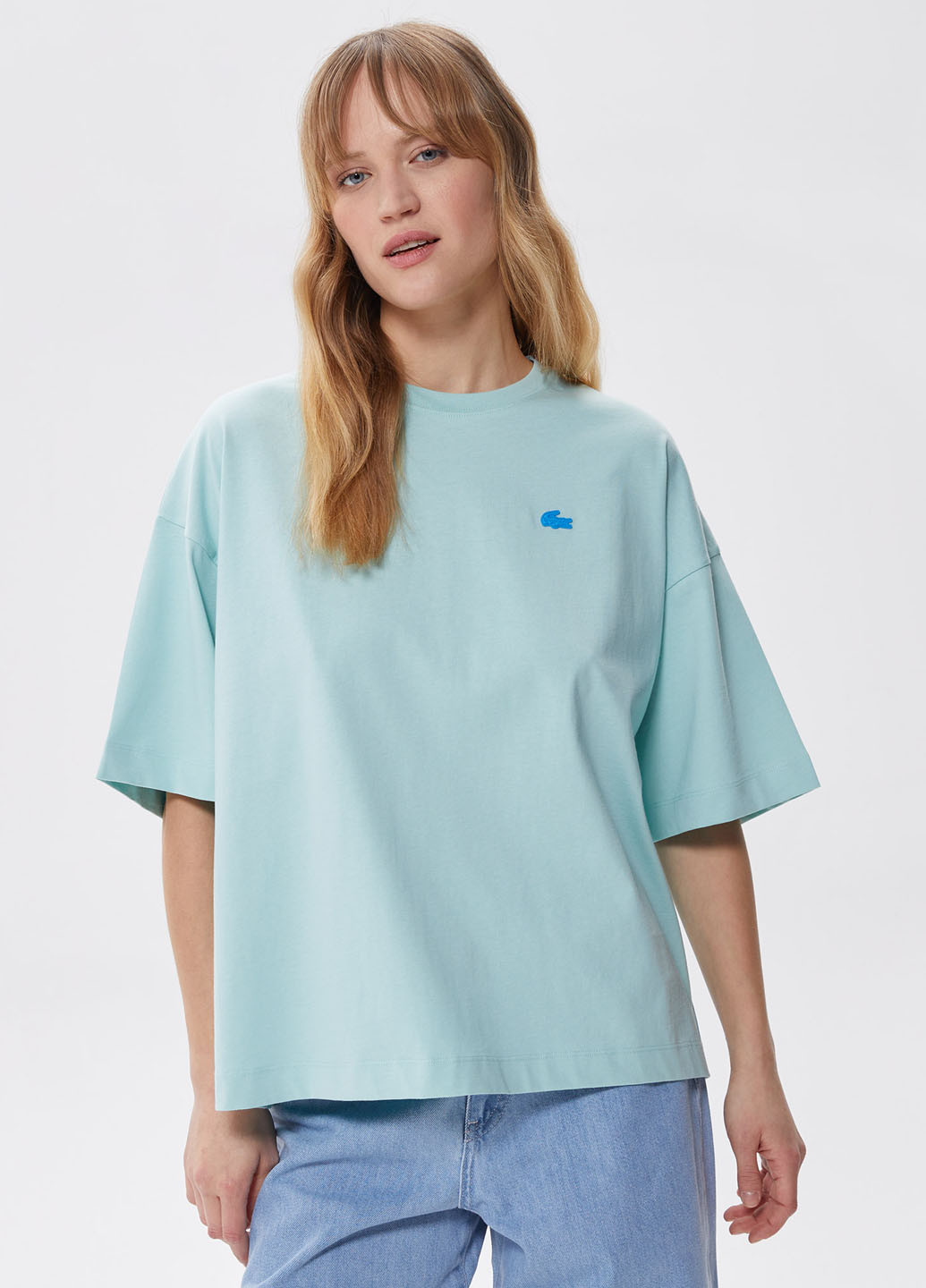 Светло-голубая всесезон футболка Lacoste