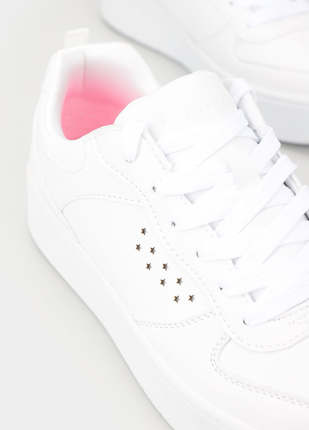 Белые кеды Skechers