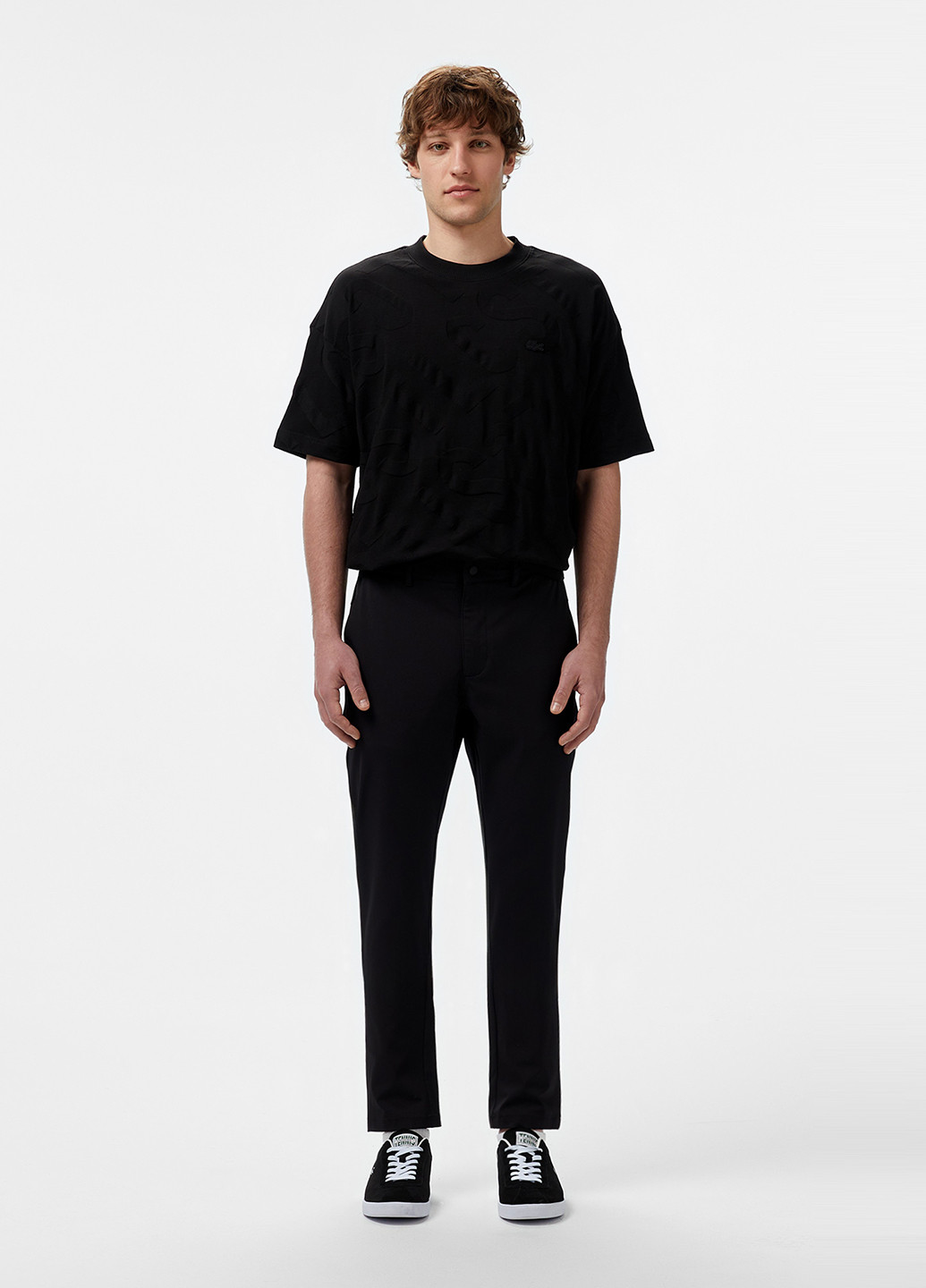 Черные кэжуал демисезонные зауженные брюки Lacoste