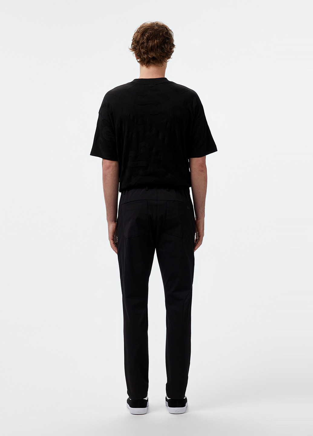 Черные кэжуал демисезонные зауженные брюки Lacoste