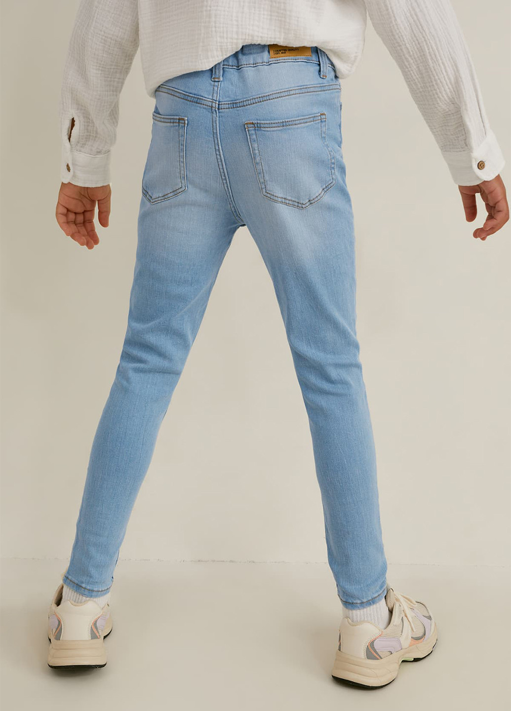 Голубые летние зауженные джинсы C&A