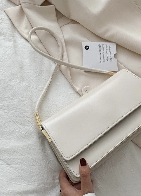 Жіноча класична сумочка клатч на короткій ручці багет біла NoName (251204332)