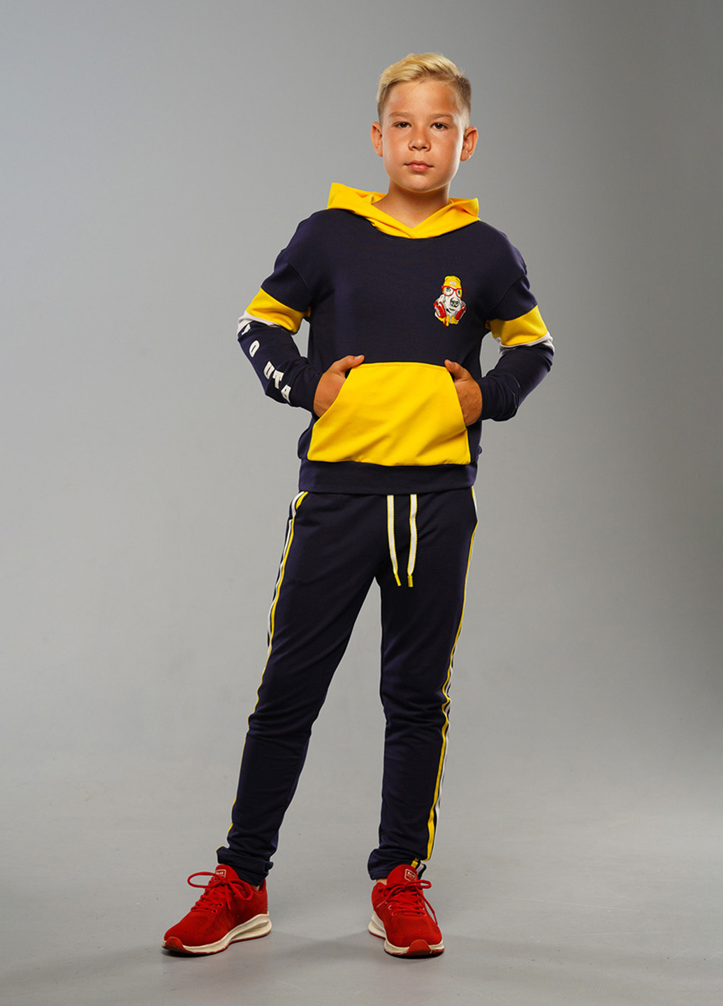 Сине-желтый демисезонный спортивный костюм с рисунком Sinthia (192445518)