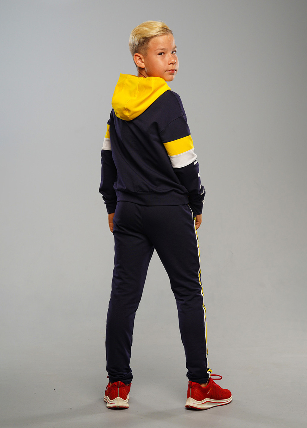 Сине-желтый демисезонный спортивный костюм с рисунком Sinthia (192445518)