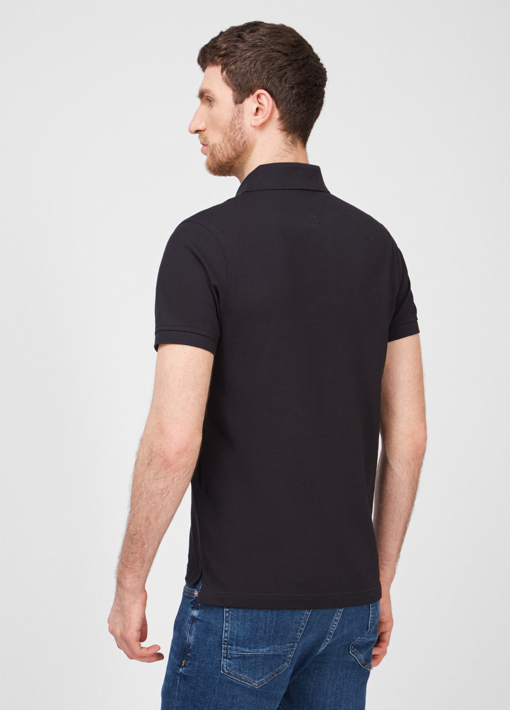 Черная футболка-поло для мужчин Tommy Hilfiger однотонная