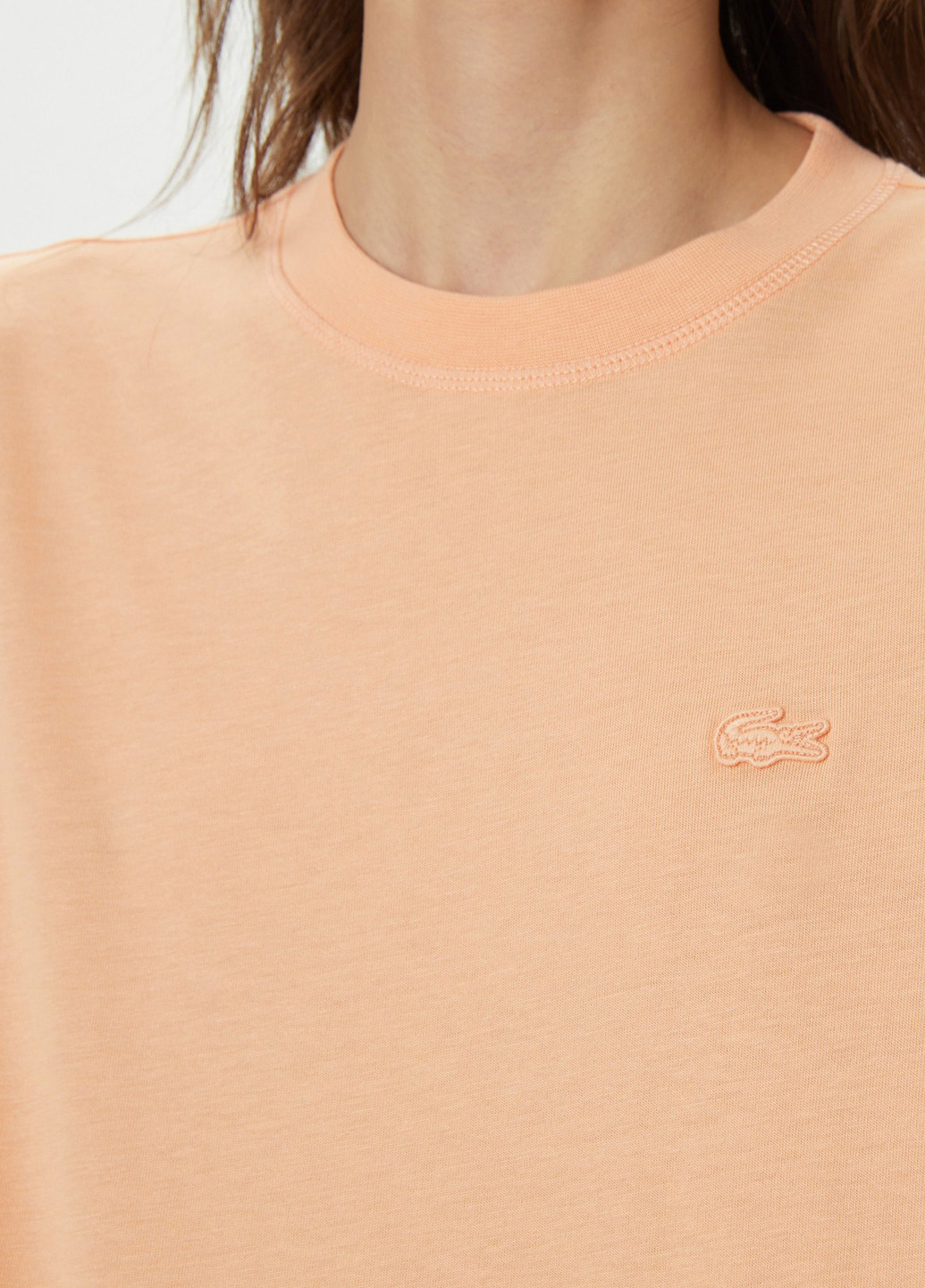 Персиковая летняя футболка Lacoste