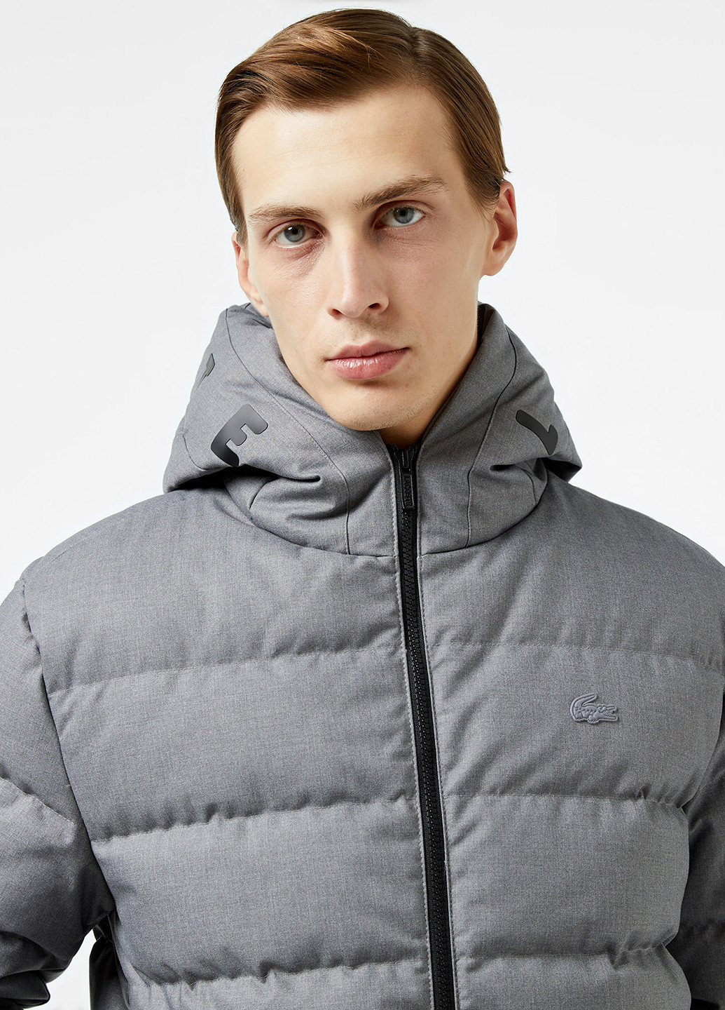 Серая зимняя куртка Lacoste