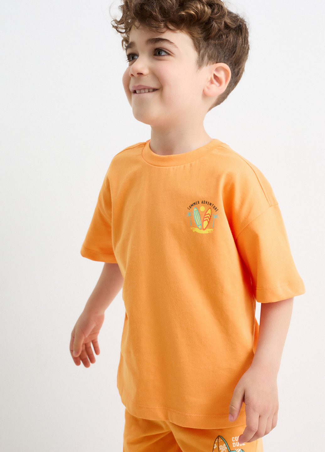 Оранжевая летняя футболка C&A
