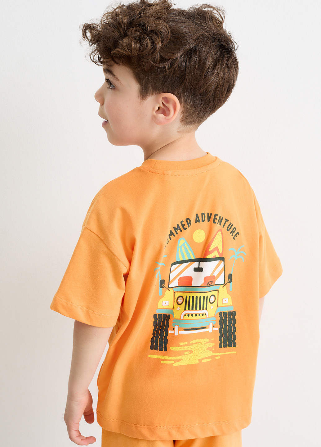 Оранжевая летняя футболка C&A