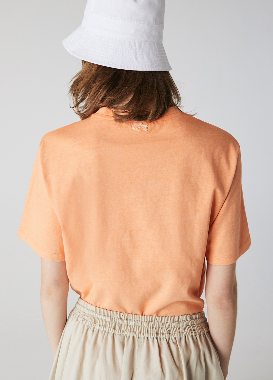 Оранжевая летняя футболка Lacoste