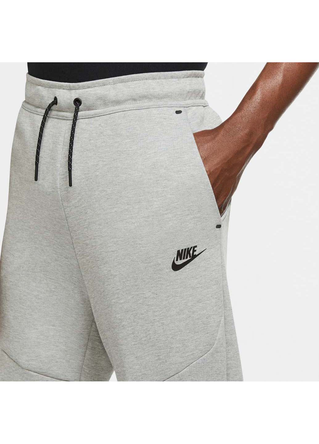 Серые спортивные демисезонные брюки Nike