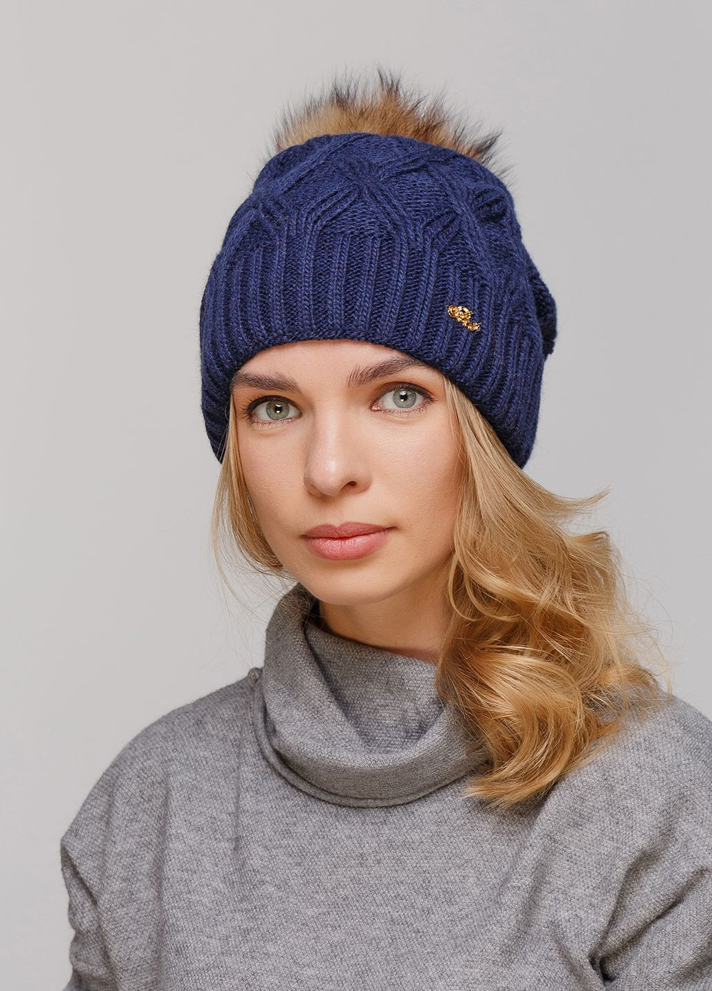 Зимова жіноча тепла шапка на флісовій підкладці 550580 Merlini (249643068)