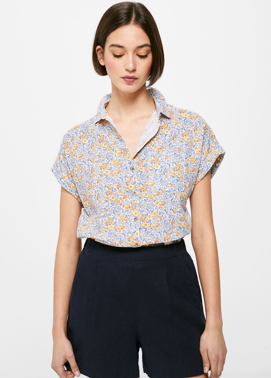 Світло-блакитна літня блузка Springfield