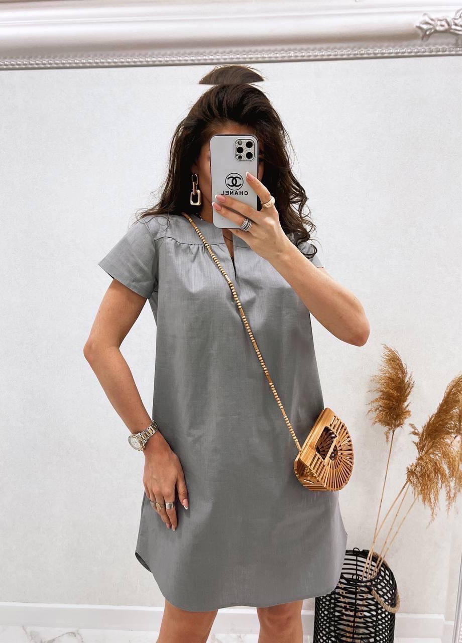 Сіра женское льняное платье свободного кроя серого цвета 359099 New Trend