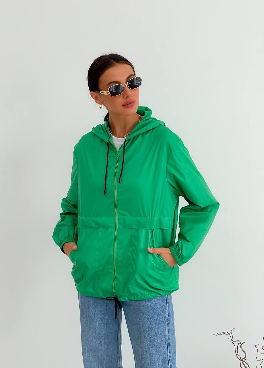 Зелена жіноча ветровка вільного крою з кишенями куртка з капюшоном зелена No Brand