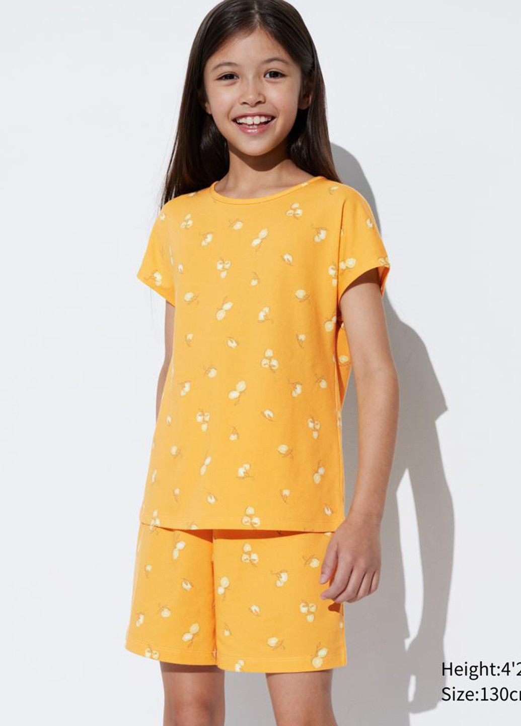 Жовтий демісезонний костюм (футболка, шорти) з шортами Uniqlo