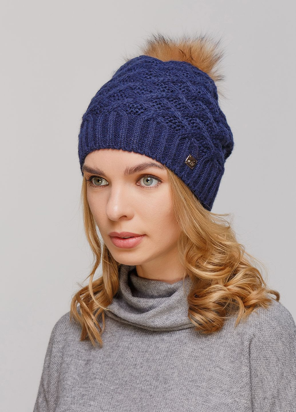 Зимняя теплая женская шапка на флисовой подкладке 550672 Merlini (249643148)