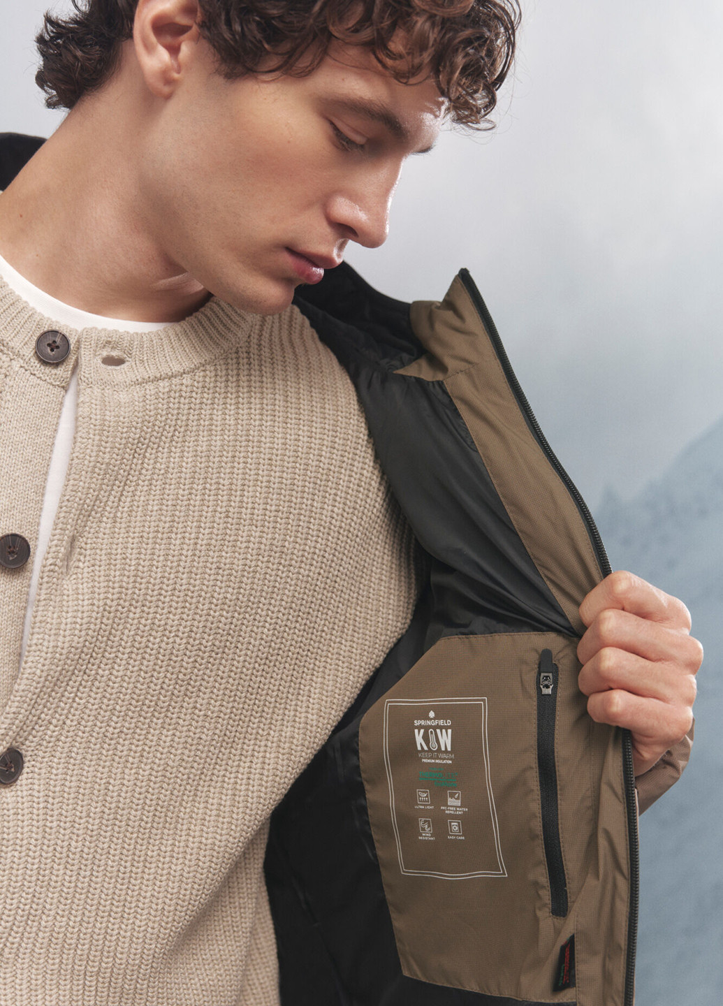 Бежева зимня куртка Springfield